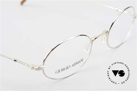 men's small oval eyeglass frames.